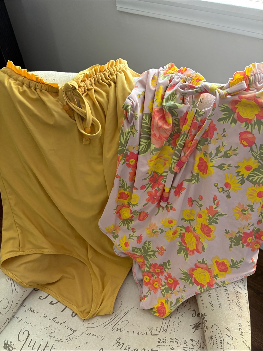 2 aerie one piece swimsuits!  One yellow and one floral. Size Large